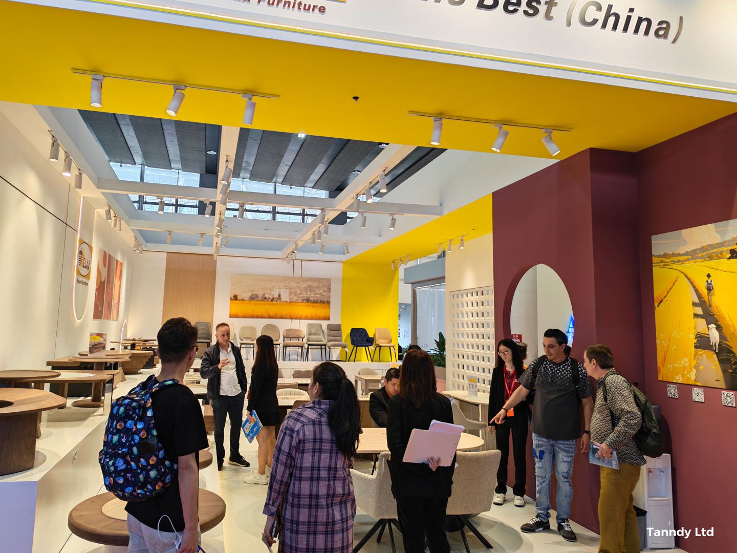 Buyers visiting a furniture booth at the Canton Fair in Guangzhou
